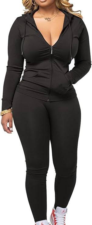 Black women's fleece hoodie set with zip-up top and matching leggings. Comfortable polyester outfit for casual or street hipster fashion.