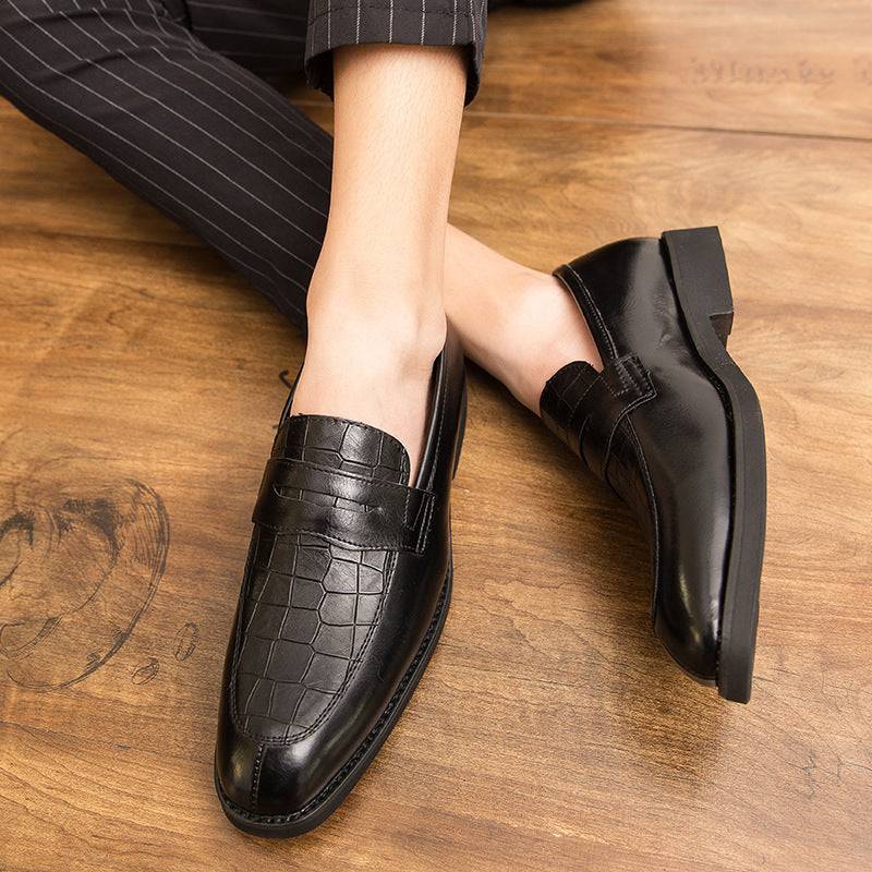 Stylish black men's pointed leather shoes with textured finish, ideal for casual and formal wear with exceptional comfort.