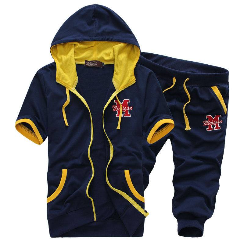 Navy men's hooded short sleeve sweater and shorts set with yellow accents and 'Michigan' logo, perfect for relaxed summer style.