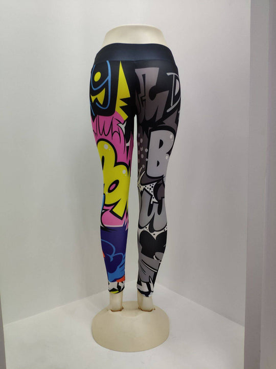 Mannequin wearing multicolor printed yoga leggings for women, showcasing comic-style graphics and slim fit polyester fabric.