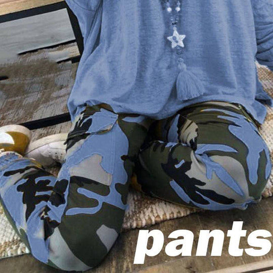 Relaxed fit plus size camo pants in blue-green tones, styled with a loose top for cozy fall-winter lounging.