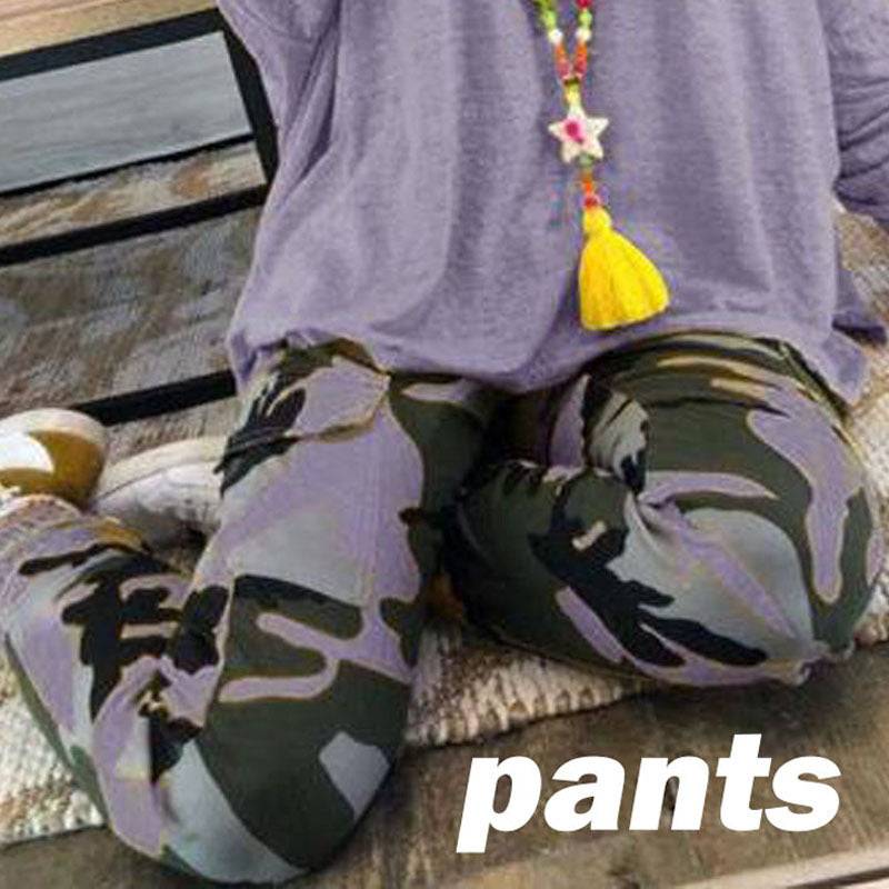 Blue-toned camo print plus size pants for women, styled with a relaxed top, ideal for cozy fall-winter days.