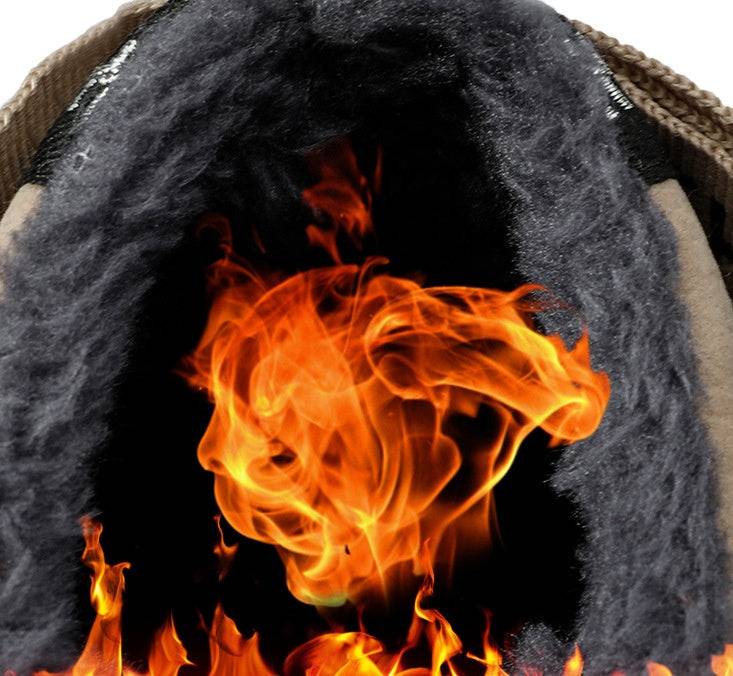 Interior view of men's high-top sneaker with warm fleece lining and fire graphic, highlighting thermal insulation for winter comfort.