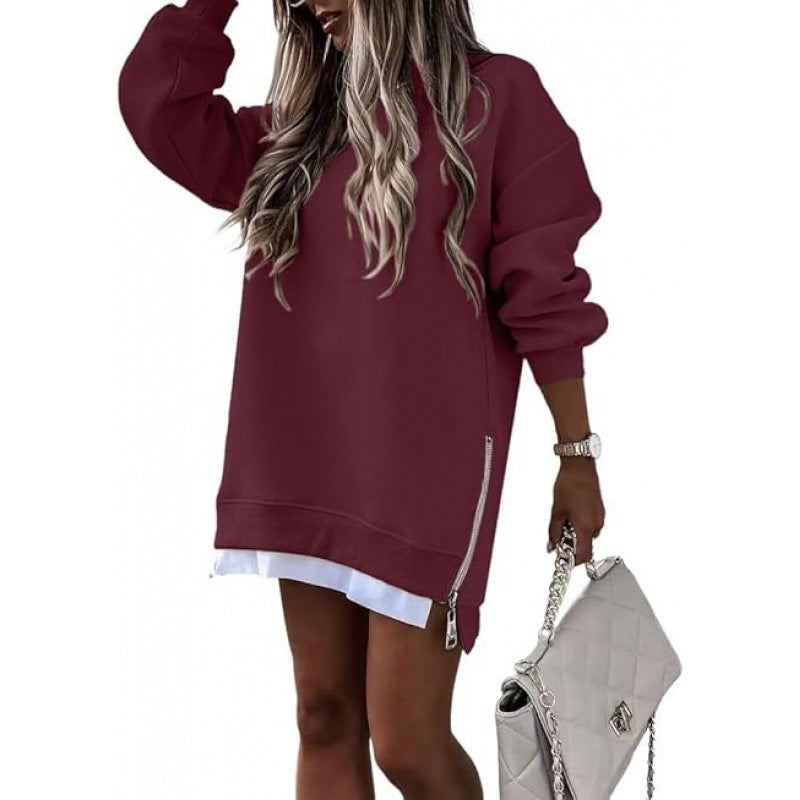 Burgundy stitching side zipper pullover sweater for women, perfect for fall and winter, styled with white shirt and quilted handbag.