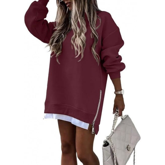 Burgundy stitching side zipper pullover sweater for women, perfect for fall and winter, styled with white shirt and quilted handbag.