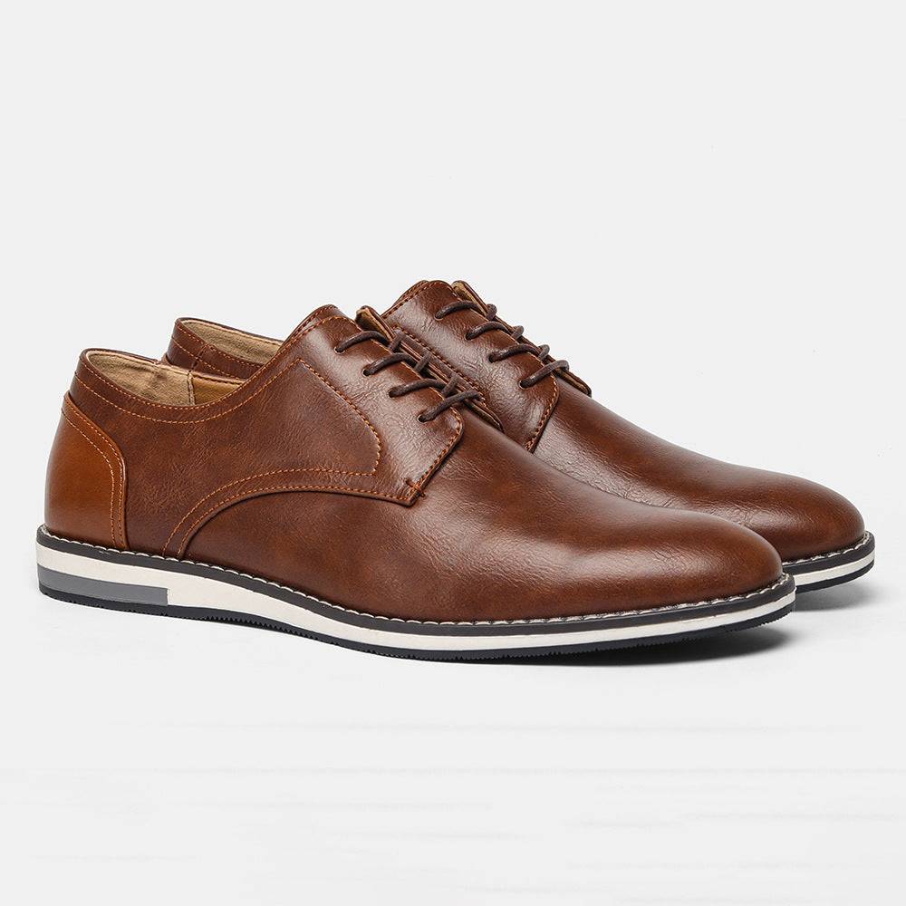 Brown leather-look plus size men’s shoes with breathable design and colorblock heel, suitable for casual and dress occasions.