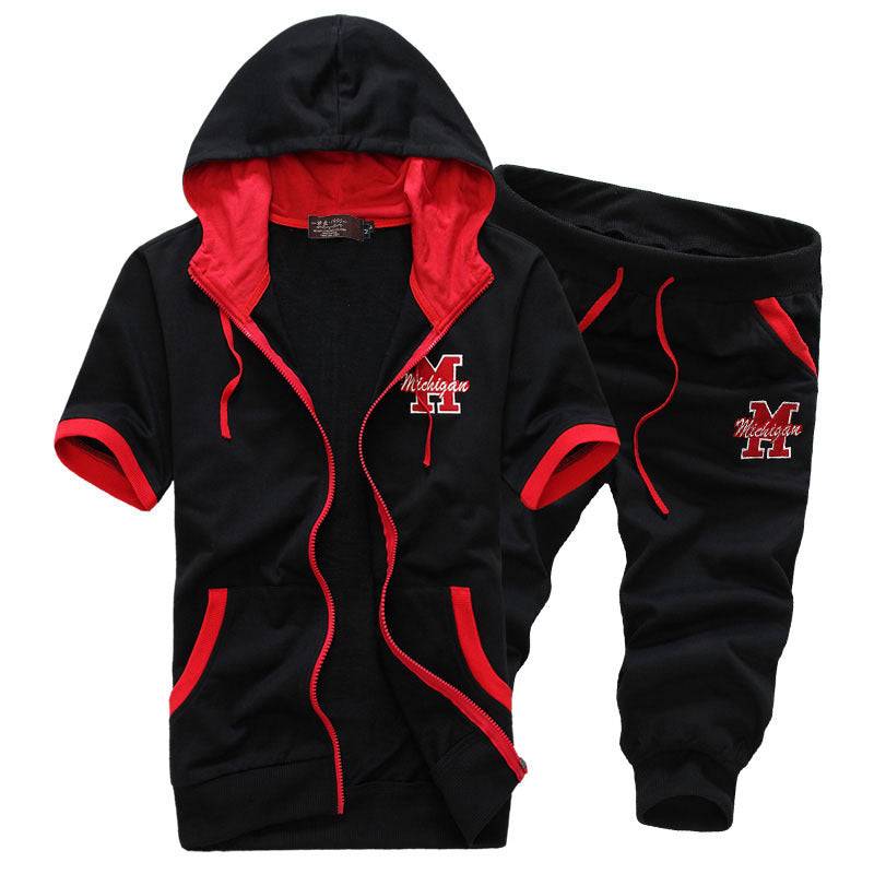 Black men's hooded short sleeve sweater and shorts set with red trim and 'Michigan' embroidery, combining sporty and urban fashion.