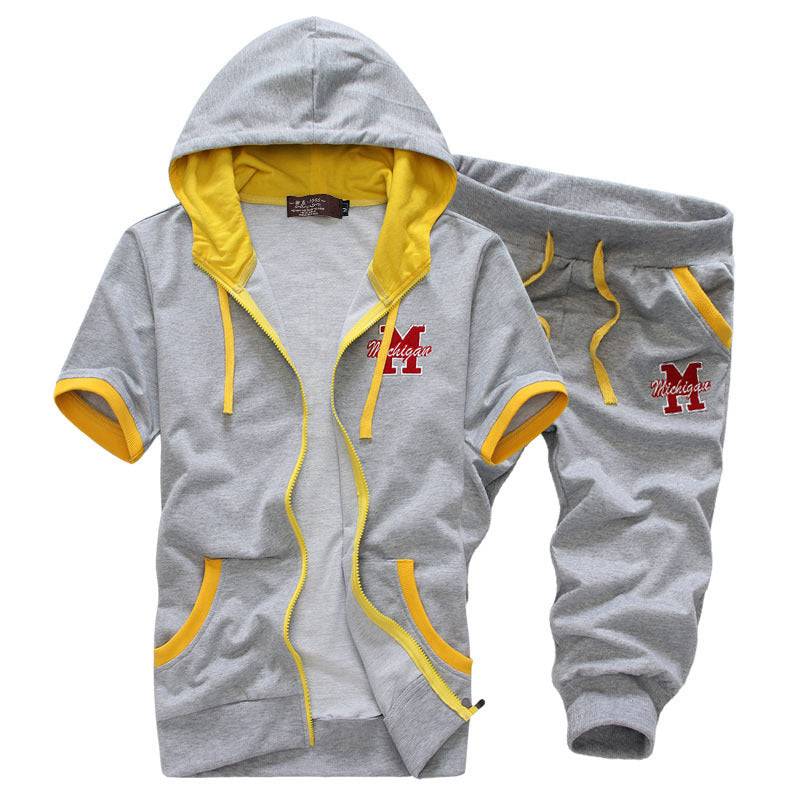 Gray men's hooded short sleeve sweater and shorts set with yellow trim, featuring 'Michigan' embroidery for casual athletic wear.