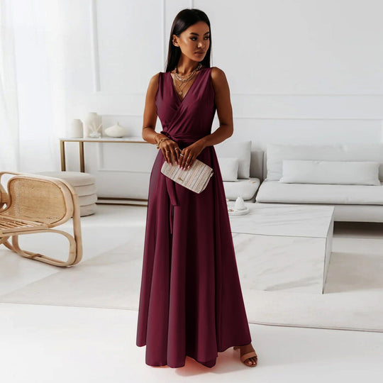 Wine red V-neck sleeveless maxi dress for women, featuring a belted waist for elegant summer party looks.