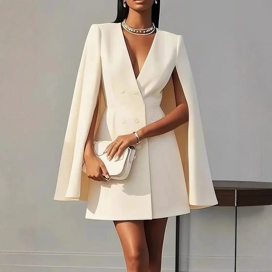 Apricot Shawl Cape Suit Dress - Commuter Style featuring a double-breasted design and cape sleeves. Chic mini dress in sizes S-XXL.
