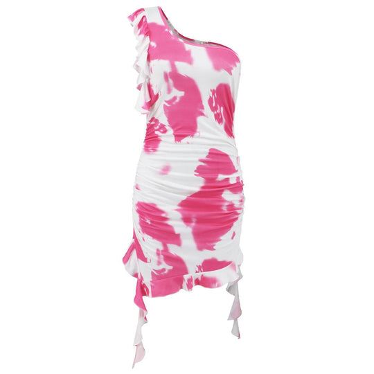 Pink tie-dye ruffle sheath dress displayed on a mannequin. One-shoulder short skirt with ruched sides and flowing hem.