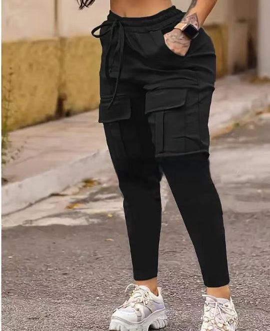 Black European American solid work pants with cargo pockets and elastic waistband, designed for women seeking comfort and utility.