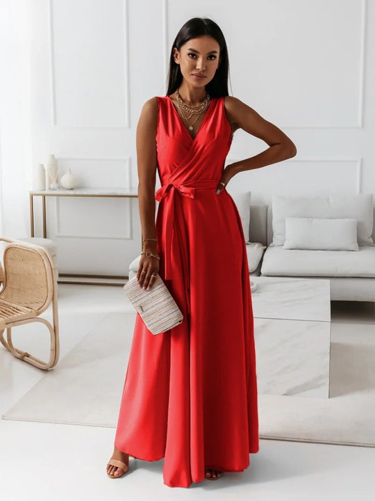 Vibrant red V-neck sleeveless maxi dress with waist tie, perfect for summer evening parties and fashionable outings.