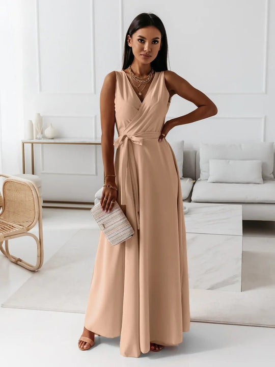 Beige V-neck sleeveless maxi dress with belt for women, perfect for summer parties and elegant club nights.