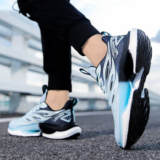 Lightweight fashion TPU popcorn sneaker in gradient blue and black, designed with a modern silhouette and shock-absorbing sole for active wear.