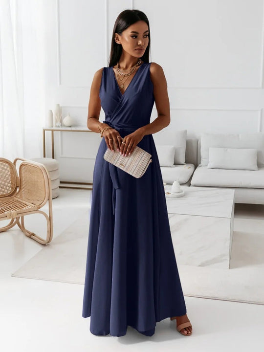 Navy blue V-neck sleeveless maxi dress for women with belt, designed for stylish summer parties or club events.
