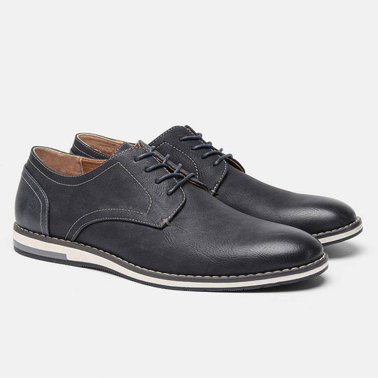 Navy blue version of plus size men’s breathable shoes with colorblock heel and white sole, offering a sleek and modern look.