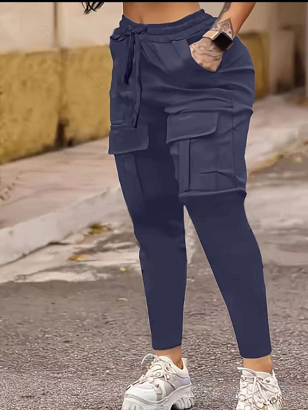 Navy blue European American solid work pants with cargo pockets and tapered legs, perfect for women’s versatile and stylish outfits.