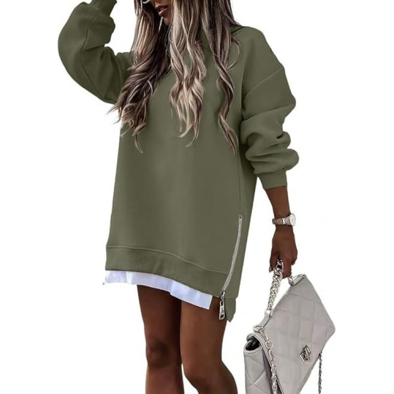 Green fall winter pullover sweater for women with side zipper design, worn over a white shirt for a layered seasonal look.