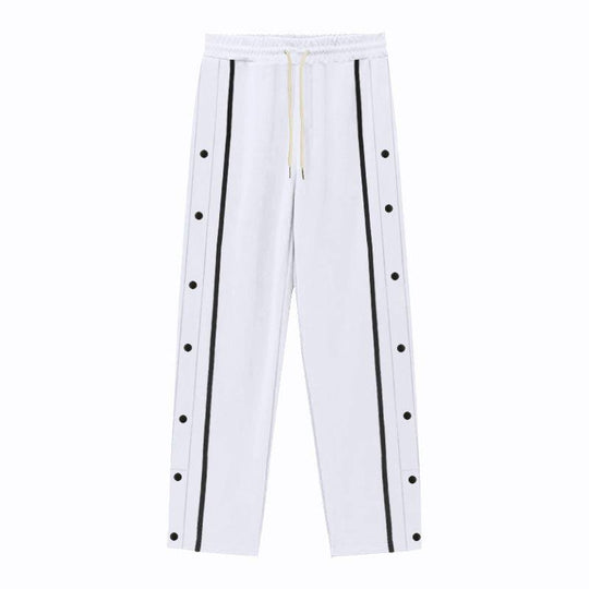 Flat-lay of white men's casual sports pants with black side stripes and button accents, perfect for versatile casual outfits.